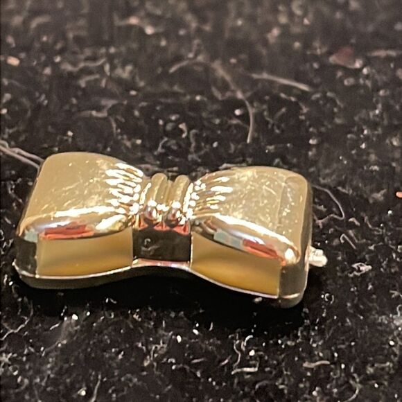 5/8” gold tone bow tie charm/pendant with double sided jump hoop - Picture 6 of 10